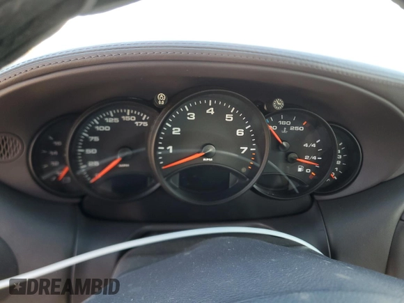 2000 Porsche 911 z VIN WP0AA2996YS621130, wystawiony jako Copart lot #77096434 z przebiegiem Nie podano mil oraz Szkoda całkowita • Salvage title. Historia ofert i sprzedaży dostępna na DreamBid. Obrazek 9.