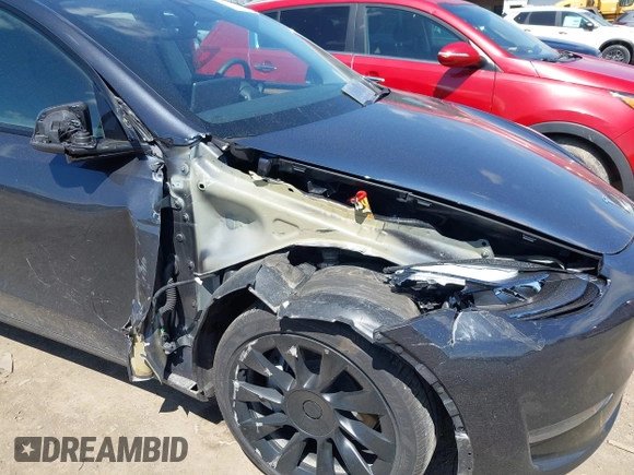 2024 Tesla Model Y Long Range with VIN 7SAYGAEE4RF078906, listed as a IAAI auction lot 42051207 with Not Provided miles and . Bid and sale history available at DreamBid. Image 6.