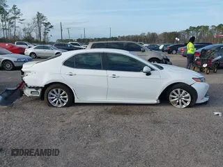 2019 Toyota Camry LE with VIN 4T1B11HK7KU806197, listed as a IAAI auction lot 41721148 with 83,373 mi miles and . Bid and sale history available at DreamBid. Image 13.