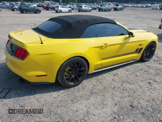 2015 Ford Mustang GT Premium z VIN 1FATP8FF9F5323726, wystawiony jako IAAI lot #42479740 z przebiegiem 68 581 mil mil oraz . Historia ofert i sprzedaży dostępna na DreamBid. Obrazek 4.
