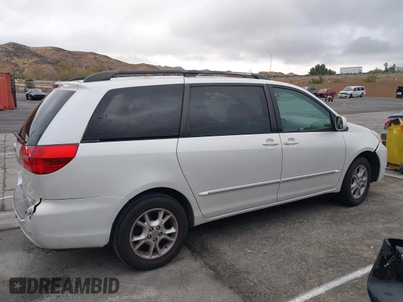2004 Toyota Sienna XLE with VIN 5TDZA22C94S084569, listed as a IAAI auction lot 41482040 with 210,157 mi miles and . Bid and sale history available at DreamBid. Image 13.