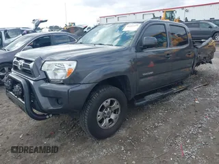 2013 Toyota Tacoma PreRunner with VIN 5TFJX4GN2DX018635, listed as a IAAI auction lot 41223225 with 275,094 mi miles and . Bid and sale history available at DreamBid. Image 2.