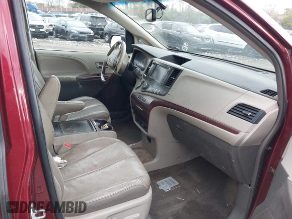 2013 Toyota Sienna XLE with VIN 5TDDK3DC1DS052600, listed as a IAAI auction lot 42055747 with 187,615 mi miles and . Bid and sale history available at DreamBid. Image 5.