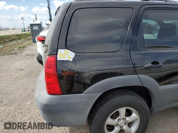 2005 Mazda Tribute i with VIN 4F2YZ02Z05KM51509, listed as a Copart auction lot 75985994 with Not Provided miles and Salvage Title. Bid and sale history available at carsss.com. Image 13.