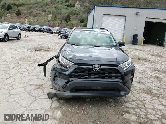2019 Toyota RAV4 XLE with VIN JTMP1RFVXKD508099, listed as a Copart auction lot 51432015 with 90,487 mi miles and Salvage Title. Bid and sale history available at DreamBid. Image 12.
