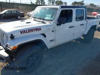 2022 Jeep Gladiator Willys with VIN 1C6HJTAG1NL117631, listed as a IAAI auction lot 41230291 with 33,463 mi miles and . Bid and sale history available at DreamBid. Image 6.