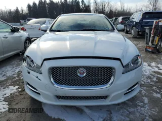2015 Jaguar XJ Portfolio z VIN SAJWJ2GD5F8V77355, wystawiony jako Copart lot #47214835 z przebiegiem 73 202 mil mil oraz Szkoda całkowita • Salvage title. Historia ofert i sprzedaży dostępna na DreamBid. Obrazek 5.