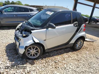 2009 Smart fortwo Pure with VIN WMEEJ31X49K224990, listed as a Copart auction lot 52111335 with 72,317 mi miles and Salvage Title. Bid and sale history available at carsss.com. Image 1.