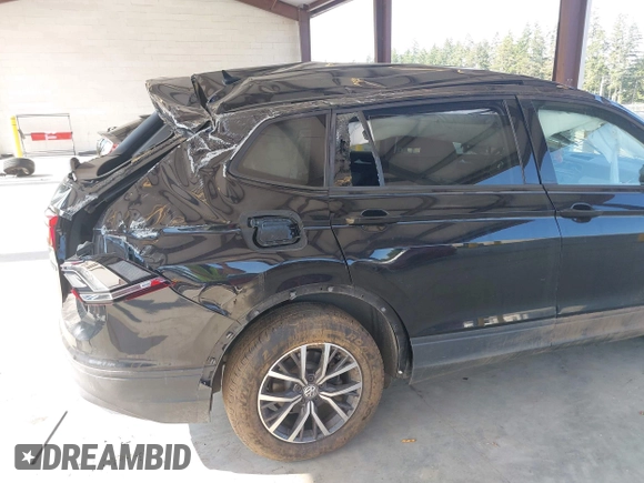 2021 Volkswagen Tiguan S with VIN 3VV0B7AX1MM098300, listed as a IAAI auction lot 42574636 with 53,559 mi miles and . Bid and sale history available at DreamBid. Image 6.