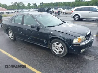 2001 Lincoln LS w/Base Pkg z VIN 1LNHM87A11Y601193, wystawiony jako IAAI lot #42341770 z przebiegiem 187 845 mil mil oraz . Historia ofert i sprzedaży dostępna na DreamBid. Obrazek 1.