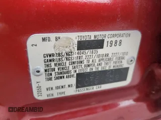 1988 Toyota Camry z VIN JT2SV21W9J0191632, wystawiony jako Copart lot #82323554 z przebiegiem 145 961 mil mil oraz Szkoda całkowita • Salvage title. Historia ofert i sprzedaży dostępna na DreamBid. Obrazek 12.