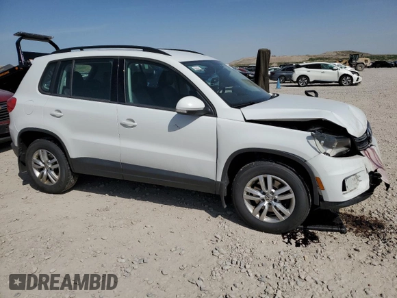 2017 Volkswagen Tiguan S with VIN WVGBV7AX8HK028302, listed as a Copart auction lot 52617685 with 108,191 mi miles and Salvage Title. Bid and sale history available at DreamBid. Image 4.