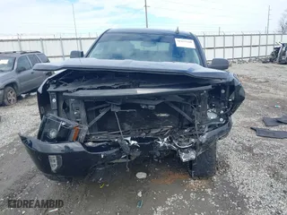 2017 Chevrolet Silverado 1500 LT with VIN 3GCUKREC9HG374973, listed as a IAAI auction lot 41423560 with 141,661 mi miles. Bid and sale history available at carsss.com. Image 12.