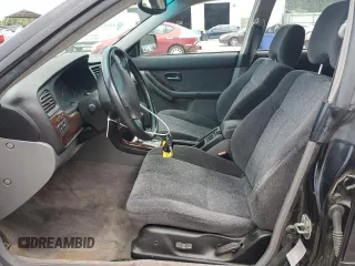 2000 Subaru Legacy with VIN 4S3BH6458Y7305971, listed as a Copart auction lot 59620325 with 135,546 mi miles and Salvage title. Bid and sale history available at DreamBid. Image 7.
