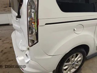 2015 Ford Transit Connect XLT z VIN NM0GS9F71F1194474, wystawiony jako IAAI lot #41666625 z przebiegiem 111 224 mil mil oraz . Historia ofert i sprzedaży dostępna na DreamBid. Obrazek 19.