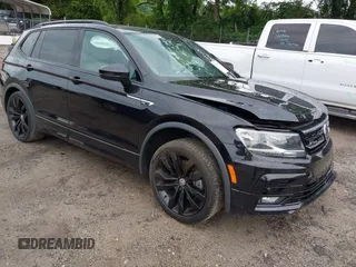 2021 Volkswagen Tiguan SE z VIN 3VV3B7AX0MM103001, wystawiony jako IAAI lot #42377671 z przebiegiem 76 606 mil mil oraz . Historia ofert i sprzedaży dostępna na DreamBid. Obrazek 1.