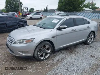 2010 Ford Taurus SHO with VIN 1FAHP2KT1AG117411, listed as a IAAI auction lot 42754452 with 156,964 mi miles and . Bid and sale history available at DreamBid. Image 2.