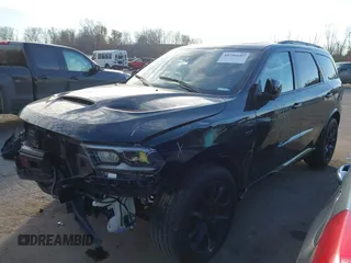 2023 Dodge Durango SRT 392 Premium with VIN 1C4SDJGJ9PC693449, listed as a IAAI auction lot 40796697 with 4,633 mi miles and . Bid and sale history available at DreamBid. Image 19.