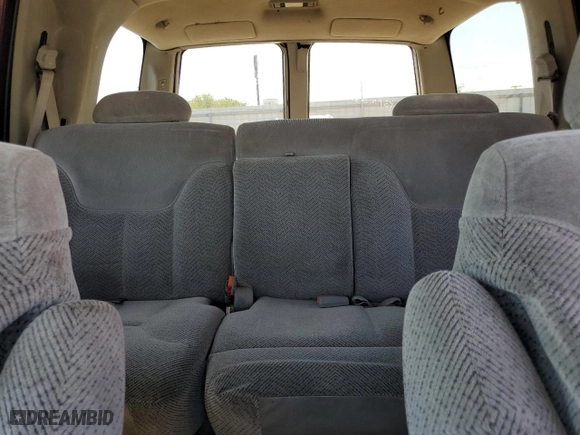 1999 Chevrolet Tahoe Z71 with VIN 1GNEK13R0XJ474557, listed as a Copart auction lot 74971964 with 217,027 mi miles and Salvage Title. Bid and sale history available at carsss.com. Image 10.