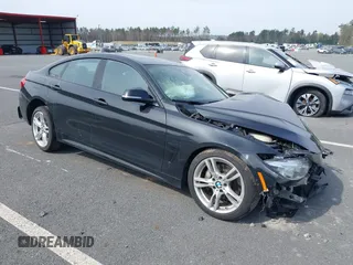 2015 BMW 4 Series 435i xDrive z VIN WBA4B3C55FGV48934, wystawiony jako IAAI lot #42098843 z przebiegiem 89 959 mil mil oraz . Historia ofert i sprzedaży dostępna na DreamBid. Obrazek 1.