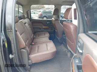 2016 Chevrolet Silverado 1500 High Country with VIN 3GCUKTEC2GG344953, listed as a IAAI auction lot 40700121 with 107,623 mi miles and . Bid and sale history available at DreamBid. Image 8.