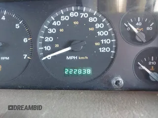 1999 Jeep Grand Cherokee Limited with VIN 1J4GW68NXXC727844, listed as a IAAI auction lot 41290773 with 222,838 mi miles. Bid and sale history available at carsss.com. Image 16.