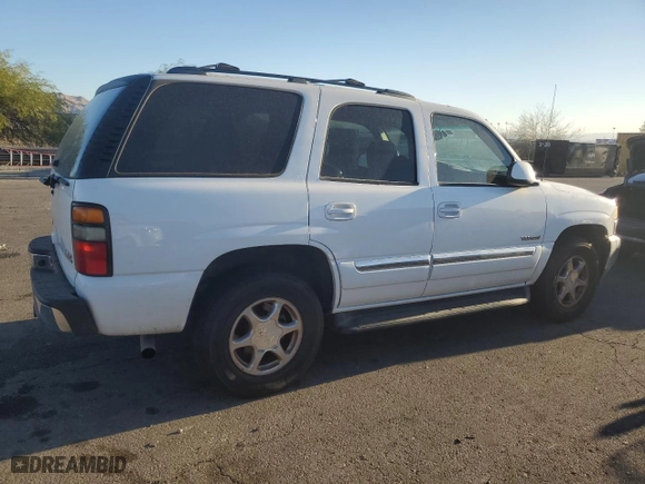 2006 GMC Yukon SLE with VIN 1GKEC13Z86R138116, listed as a Copart auction lot 77707424 with 195,129 mi miles and Salvage Title. Bid and sale history available at carsss.com. Image 3.