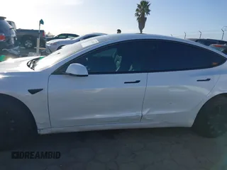 2023 Tesla Model 3 with VIN 5YJ3E1EA0PF503352, listed as a IAAI auction lot 41718658 with 28,426 mi miles and . Bid and sale history available at DreamBid. Image 14.