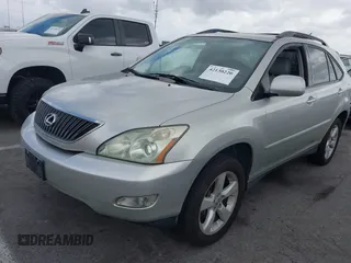 2005 Lexus RX 330 with VIN JTJGA31UX50053808, listed as a IAAI auction lot 42130220 with 187,292 mi miles. Bid and sale history available at carsss.com. Image 2.