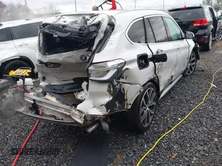 2017 BMW X1 xDrive28i with VIN WBXHT3C36H5F74818, listed as a IAAI auction lot 41853836 with 71,735 mi miles and . Bid and sale history available at DreamBid. Image 18.
