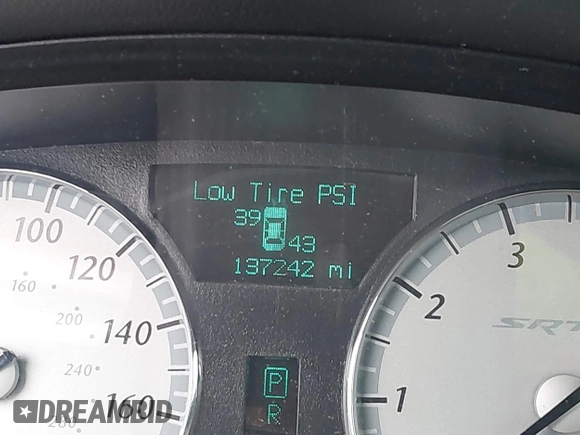 2006 Chrysler 300 C SRT8 with VIN 2C3LA73W66H249303, listed as a IAAI auction lot 42009645 with 137,242 mi miles. Bid and sale history available at carsss.com. Image 15.