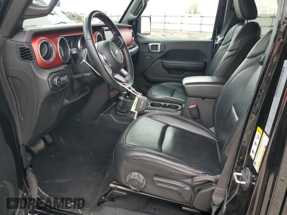 2018 Jeep Wrangler Unlimited Rubicon with VIN 1C4HJXFG4JW266438, listed as a Copart auction lot 50940075 with 75,175 mi miles and Salvage title. Bid and sale history available at DreamBid. Image 7.