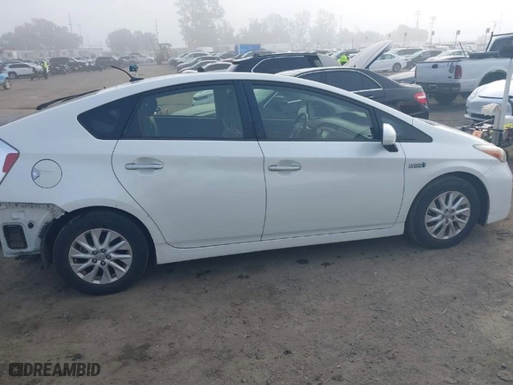 2014 Toyota Prius Plug-In with VIN JTDKN3DP5E3056511, listed as a IAAI auction lot 41230272 with 123,013 mi miles. Bid and sale history available at carsss.com. Image 14.