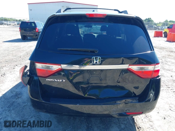 2011 Honda Odyssey EX-L with VIN 5FNRL5H67BB087064, listed as a IAAI auction lot 42326427 with 177,795 mi miles and . Bid and sale history available at DreamBid. Image 16.