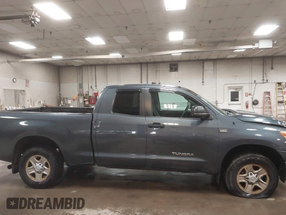 2010 Toyota Tundra 4WD Truck with VIN 5TFUM5F16AX006879, listed as a IAAI auction lot 40447273 with 219,498 mi miles. Bid and sale history available at carsss.com. Image 13.