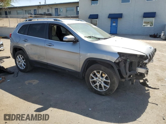 2016 Jeep Cherokee Latitude with VIN 1C4PJMCS9GW215870, listed as a Copart auction lot 57992675 with 212,594 mi miles and Salvage title. Bid and sale history available at DreamBid. Image 4.