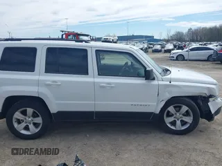 2014 Jeep Patriot Sport with VIN 1C4NJRBB5ED778512, listed as a IAAI auction lot 42172300 with 118,934 mi miles and . Bid and sale history available at carsss.com. Image 13.