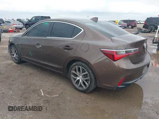 2019 Acura ILX w/Premium Pkg with VIN 19UDE2F76KA013692, listed as a IAAI auction lot 41915765 with 128,774 mi miles. Bid and sale history available at carsss.com. Image 3.