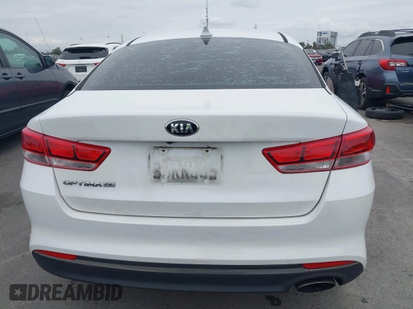2016 Kia Optima LX with VIN 5XXGT4L32GG047624, listed as a IAAI auction lot 42068219 with 114,316 mi miles. Bid and sale history available at carsss.com. Image 16.