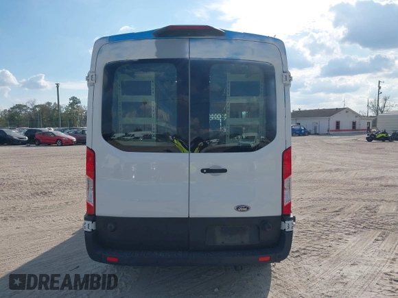 2021 Ford Transit Cargo with VIN 1FTBR1C85MKA19997, listed as a IAAI auction lot 41431285 with 61,158 mi miles and . Bid and sale history available at DreamBid. Image 16.