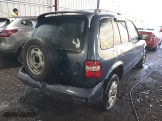 2002 Kia Sportage with VIN KNDJB723X25134499, listed as a IAAI auction lot 41273605 with 1 mi miles. Bid and sale history available at carsss.com. Image 4.