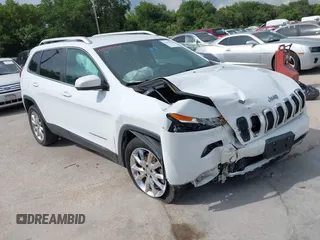 2014 Jeep Cherokee Limited with VIN 1C4PJLDB1EW158523, listed as a IAAI auction lot 42605984 with 124,250 mi miles and . Bid and sale history available at DreamBid. Image 1.