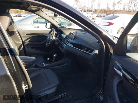 2018 BMW X1 xDrive28i with VIN WBXHT3C36J5L29746, listed as a IAAI auction lot 41547100 with 103,420 mi miles and . Bid and sale history available at DreamBid. Image 5.