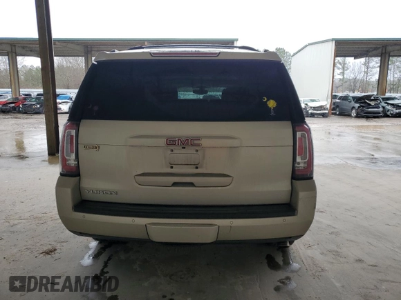 2015 GMC Yukon SLE with VIN 1GKS1AKC5FR120713, listed as a Copart auction lot 48009325 with 133,372 mi miles and Salvage Title. Bid and sale history available at carsss.com. Image 6.