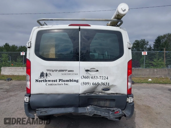 2015 Ford Transit Cargo with VIN 1FTNR1ZM6FKA34609, listed as a IAAI auction lot 42635875 with 214,750 mi miles and . Bid and sale history available at DreamBid. Image 16.