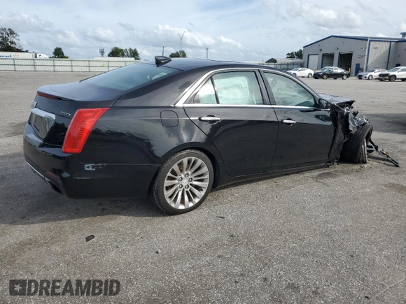 2016 Cadillac CTS Luxury Collection AWD with VIN 1G6AX5SX2G0171871, listed as a Copart auction lot 77128424 with Not Provided miles and Salvage Title. Bid and sale history available at DreamBid. Image 3.