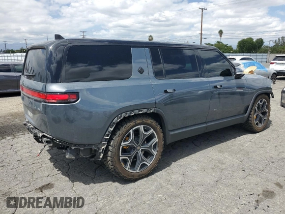 2022 Rivian R1S Launch Edition z VIN 7PDSGABL5NN001018, wystawiony jako Copart lot #56914725 z przebiegiem 26 156 mil mil oraz Szkoda całkowita • Salvage title. Historia ofert i sprzedaży dostępna na DreamBid. Obrazek 3.