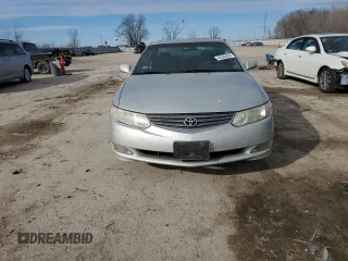 2002 Toyota Solara SE z VIN 2T1CF22P82C591916, wystawiony jako Copart lot #46362055 z przebiegiem 177 157 mil mil oraz Czysty tytuł • Clean title. Historia ofert i sprzedaży dostępna na DreamBid. Obrazek 5.