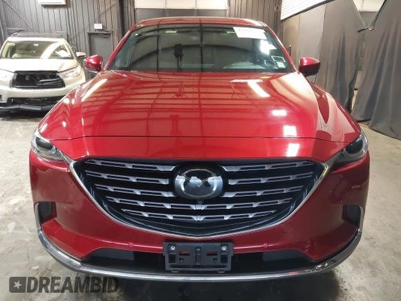 2023 Mazda CX-9 Signature with VIN JM3TCBEY4P0634153, listed as a IAAI auction lot 42132856 with 25,131 mi miles and . Bid and sale history available at DreamBid. Image 12.