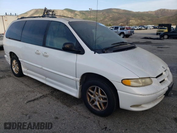 1998 Dodge Caravan LE z VIN 1B4GP54L1WB720025, wystawiony jako Copart lot #47730365 z przebiegiem 88 231 mil mil oraz Czysty tytuł • Clean title. Historia ofert i sprzedaży dostępna na DreamBid. Obrazek 4.